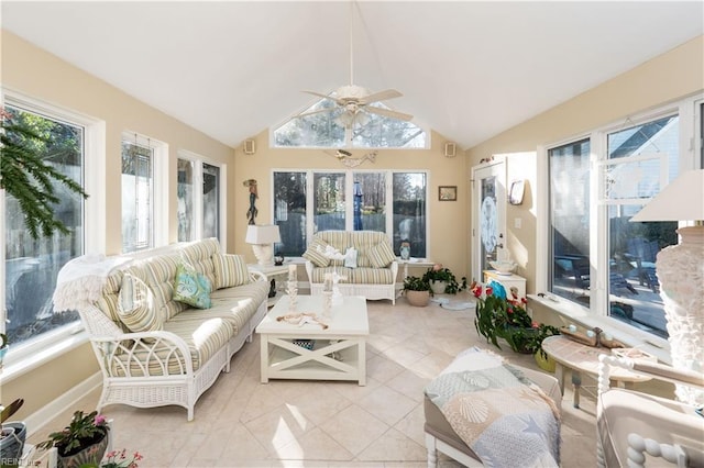 sunroom / solarium with ceiling fan and lofted ceiling