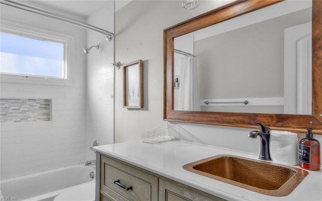 bathroom featuring vanity and shower / bath combo