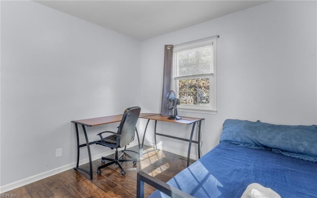 office area featuring dark wood-type flooring