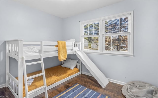 bedroom featuring dark wood-type flooring