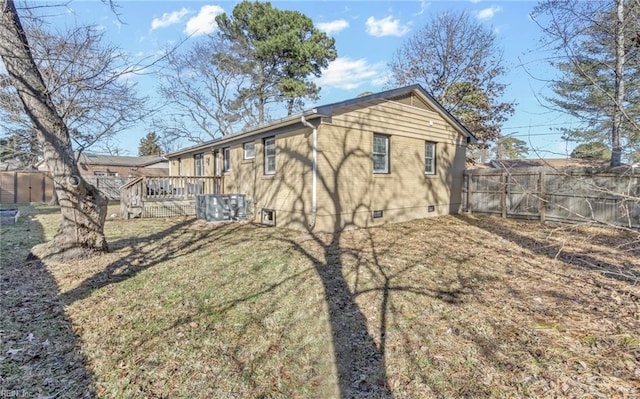 rear view of property with a deck