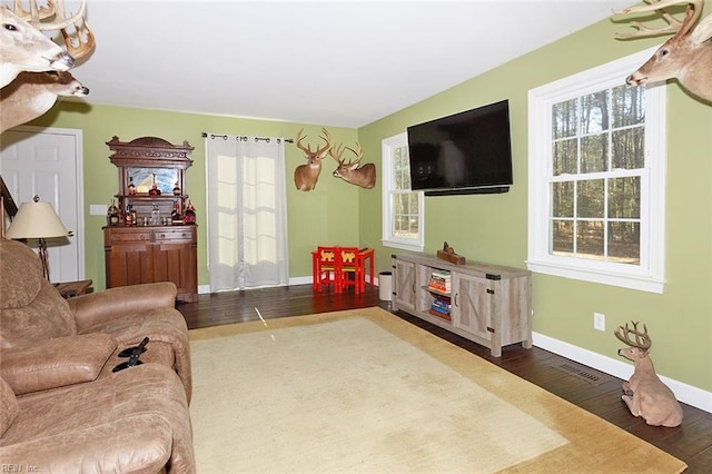 living room with dark wood-type flooring