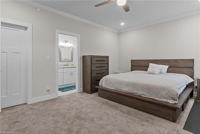 bedroom with ensuite bathroom, ceiling fan, ornamental molding, and light colored carpet