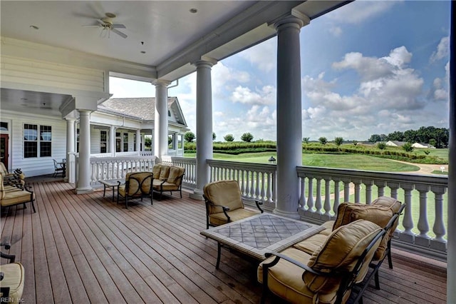 wooden deck with ceiling fan