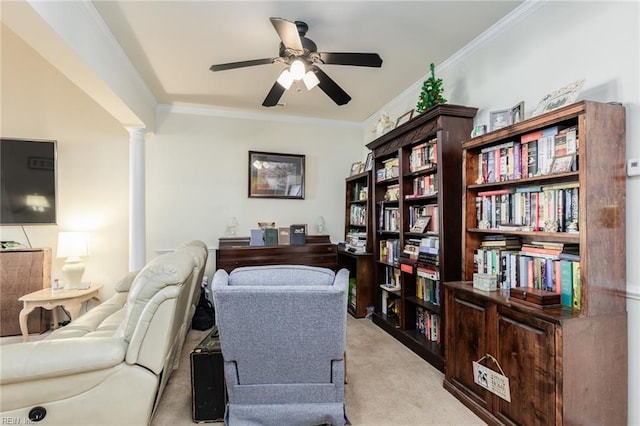 home office with light colored carpet, ornate columns, ceiling fan, and crown molding