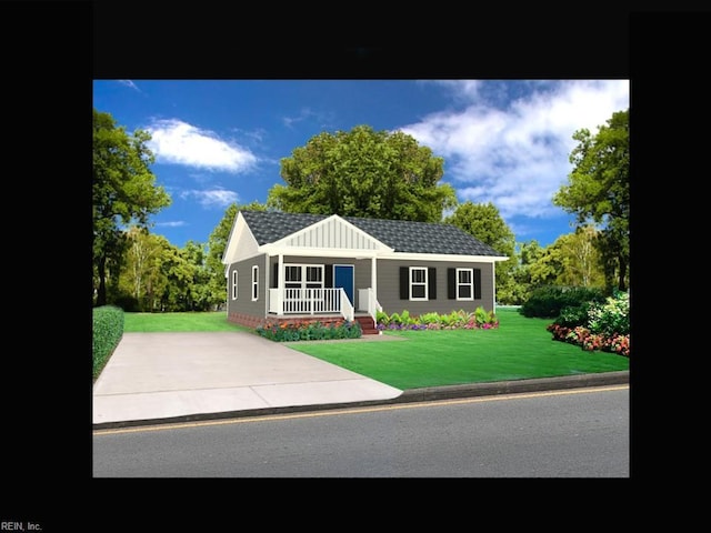 view of front of property with covered porch and a front yard