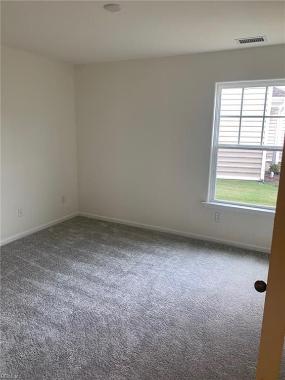 empty room with carpet floors