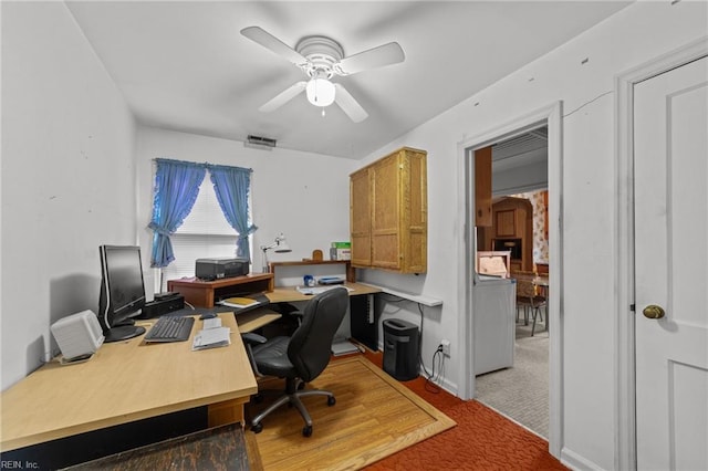 office area with ceiling fan, carpet, and washer / dryer