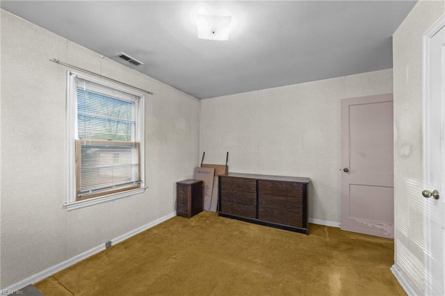 unfurnished bedroom featuring light colored carpet