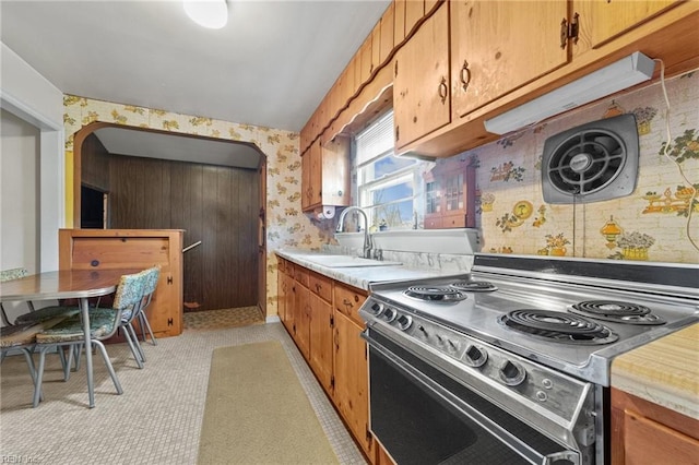 kitchen with electric range and sink