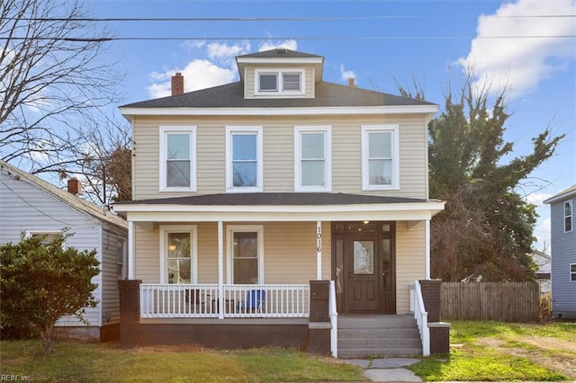 view of front of home featuring a front yard