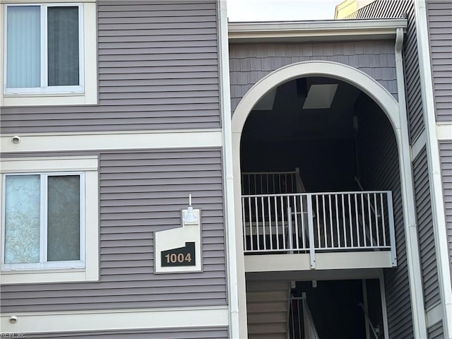 view of home's exterior with a balcony