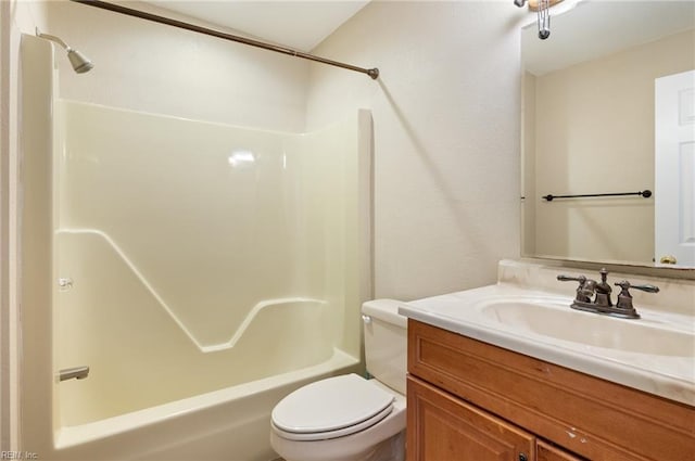 full bathroom featuring shower / bathing tub combination, vanity, and toilet