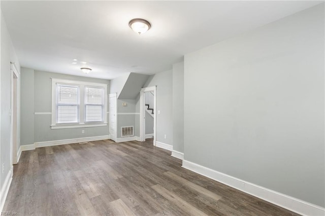 bonus room featuring hardwood / wood-style floors