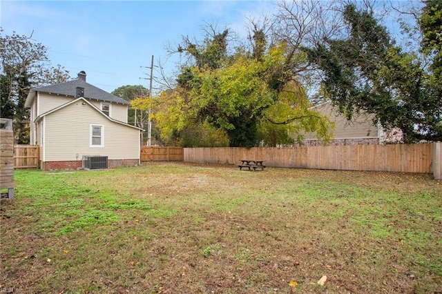 view of yard featuring central AC