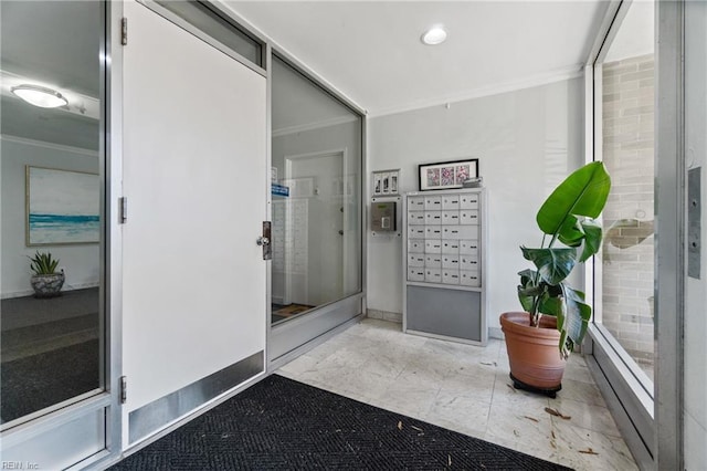 bathroom featuring mail boxes and ornamental molding