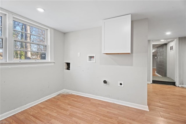 laundry area with light hardwood / wood-style floors, hookup for a washing machine, and electric dryer hookup