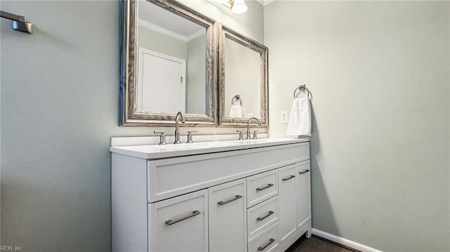 bathroom with vanity and crown molding