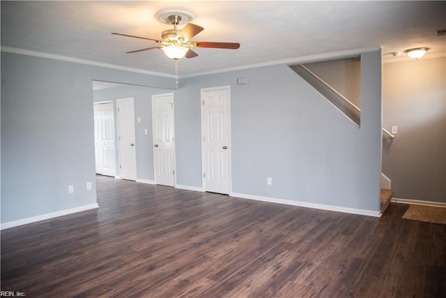 spare room featuring ceiling fan, dark hardwood / wood-style flooring, and ornamental molding