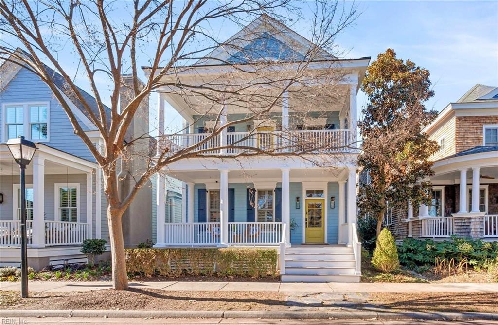 view of front of house featuring a balcony and covered porch