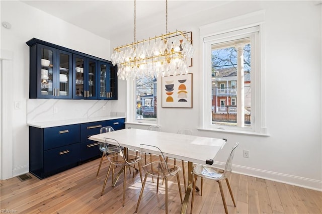 dining room featuring light hardwood / wood-style flooring