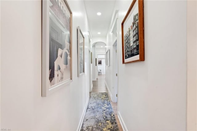 hall featuring wood-type flooring