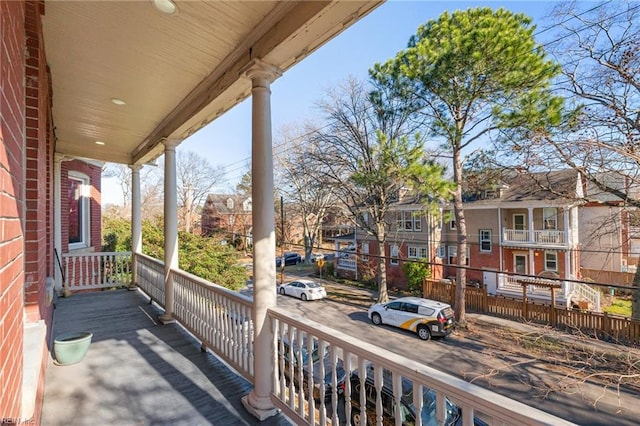 balcony featuring a porch