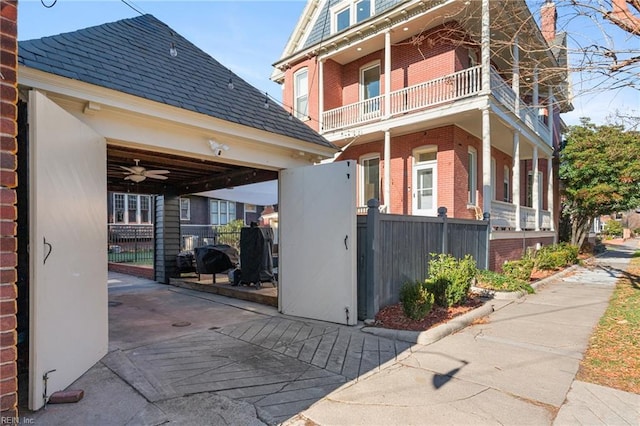 view of home's exterior with a balcony