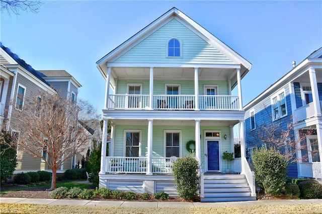 view of front of house with a balcony