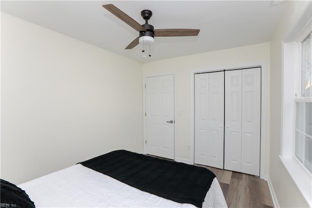 bedroom featuring a closet, ceiling fan, and light hardwood / wood-style floors