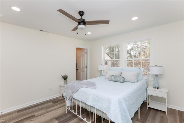 bedroom featuring ceiling fan and wood-type flooring