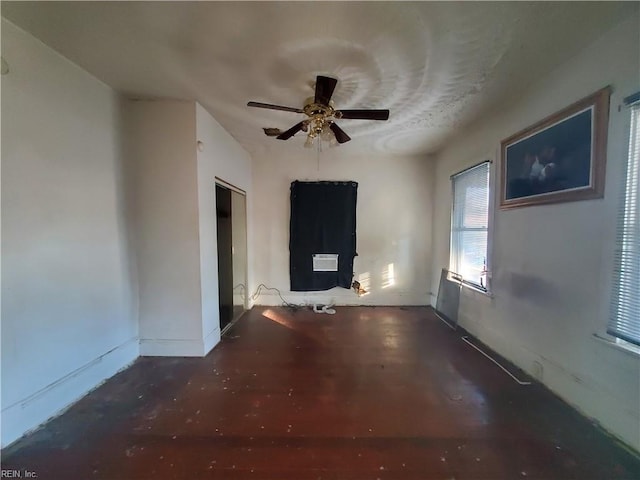 empty room featuring ceiling fan