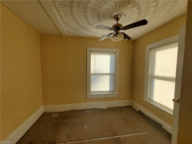 unfurnished room featuring ceiling fan