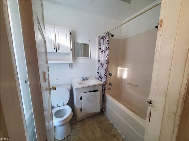 full bathroom with vanity, toilet, and shower / bath combo with shower curtain