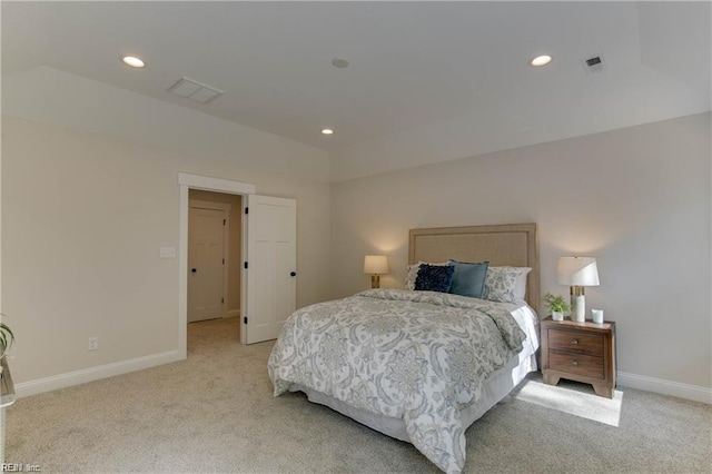 bedroom featuring light colored carpet