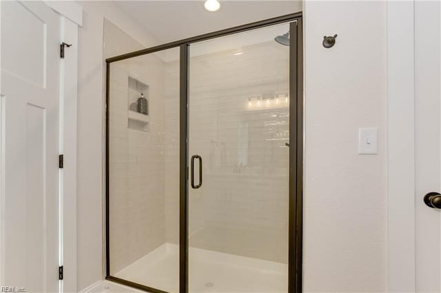 bathroom featuring walk in shower