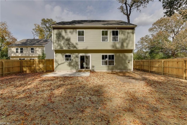 rear view of house featuring a patio area