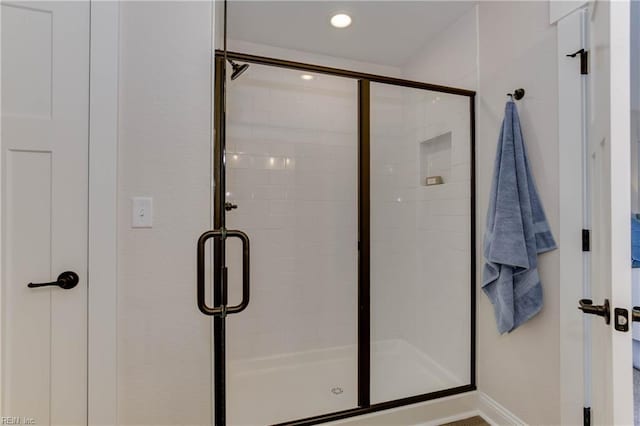 bathroom featuring walk in shower