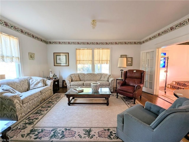 living room featuring hardwood / wood-style floors and french doors