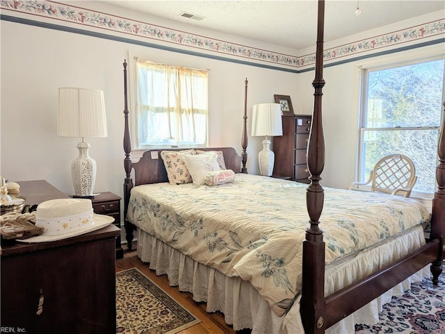 bedroom featuring hardwood / wood-style floors