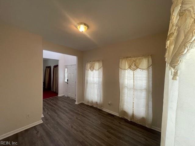 interior space featuring dark hardwood / wood-style flooring