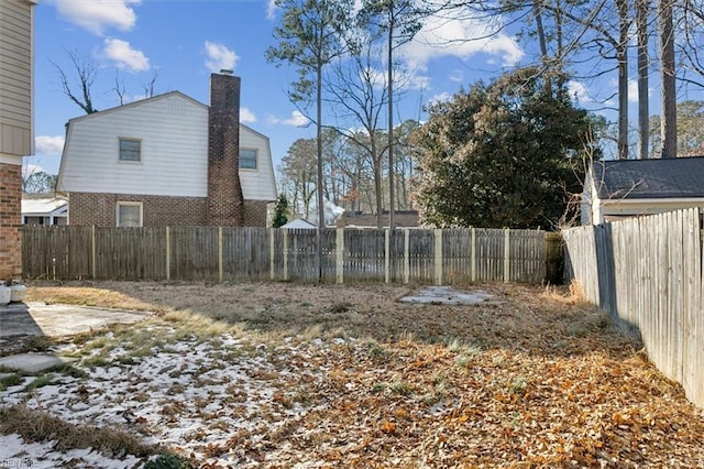 view of yard with a fenced backyard