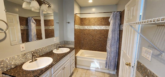 bathroom with vanity, shower / bath combo, and backsplash