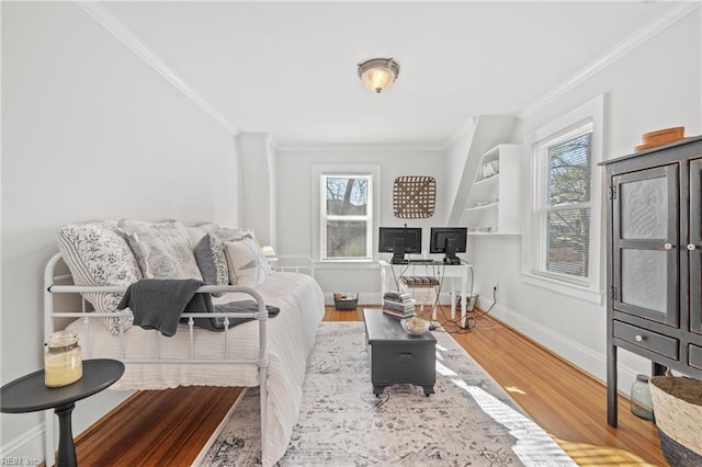 living room featuring ornamental molding and wood-type flooring