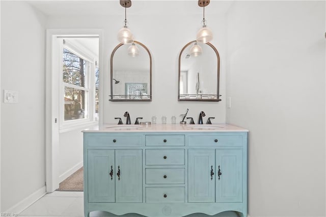 bathroom featuring tile patterned floors and vanity