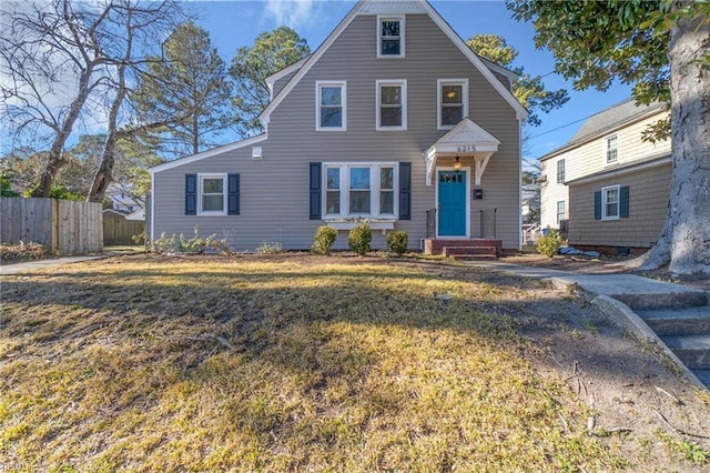 view of front of home with a front lawn