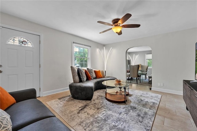 living room featuring ceiling fan