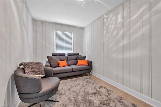 living room featuring crown molding