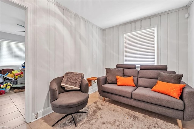 living room with a healthy amount of sunlight and light tile patterned floors