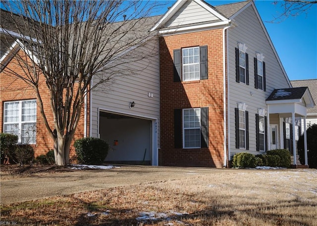 view of property exterior with a garage